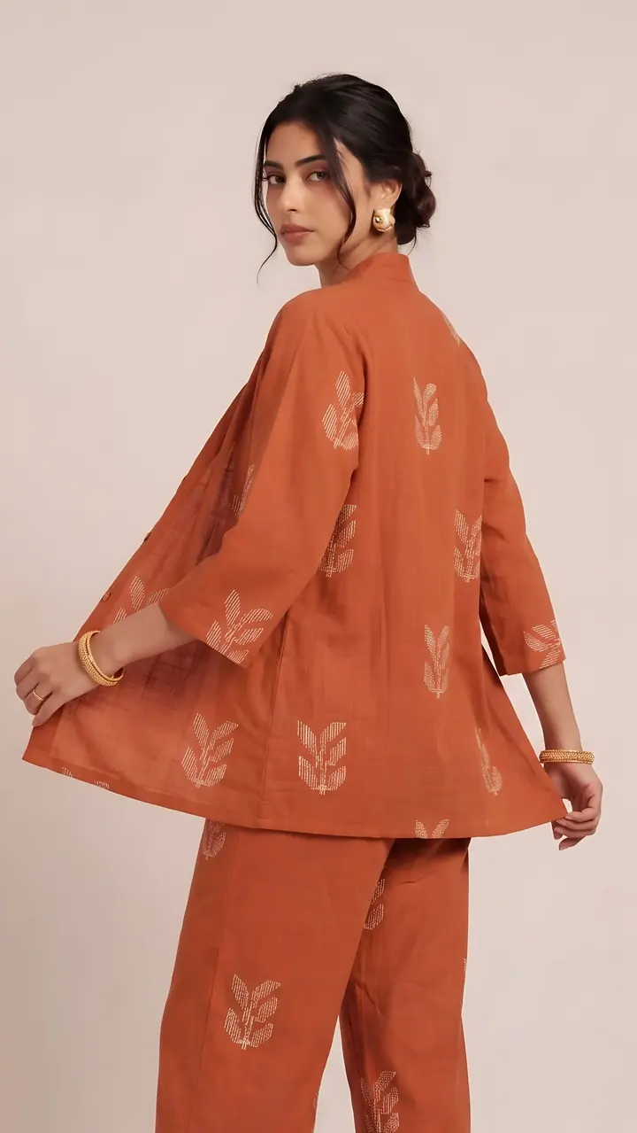 Rust co-ord set on a model, lifestyle product photography by Vayem Studios